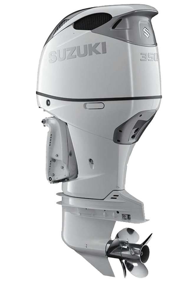 A white suzuki outboard motor sitting on top of a green background.