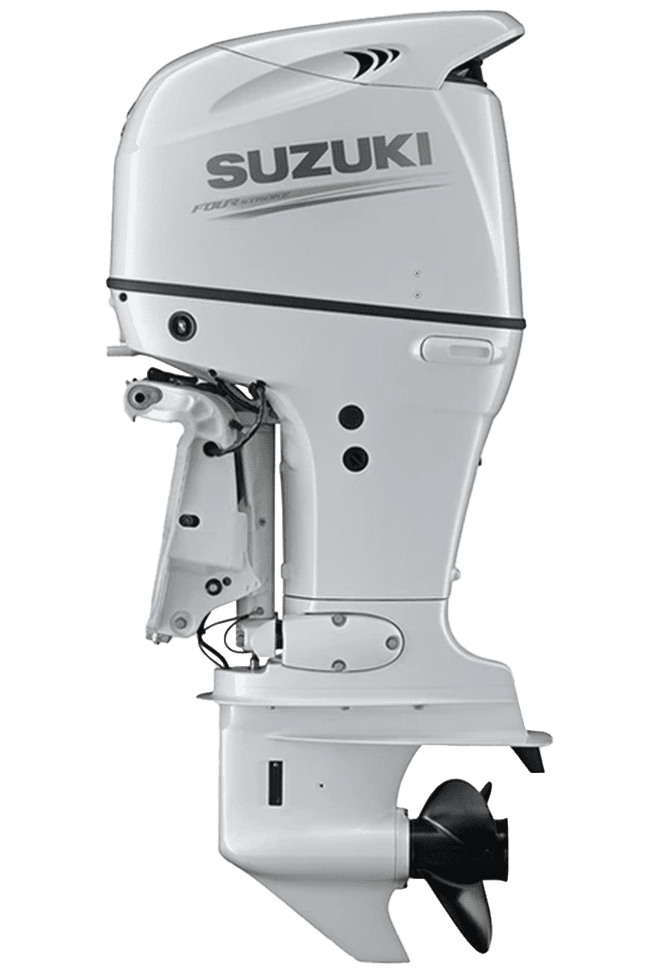 A white suzuki outboard motor sitting on top of a green background.